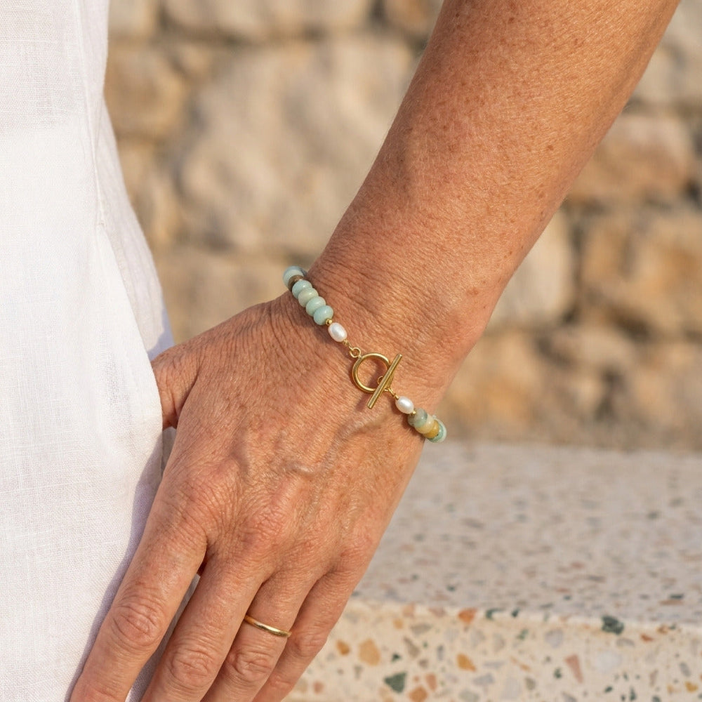 PULSERA TURQUESA CIERRE T DORADA
